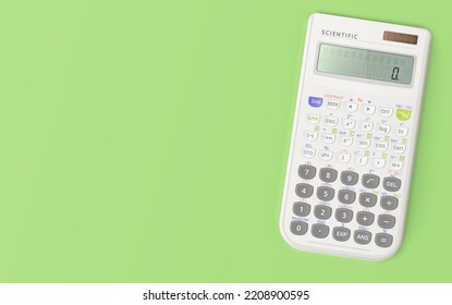 White digital scientific calculator isolated on green background. Copy space, empty space.