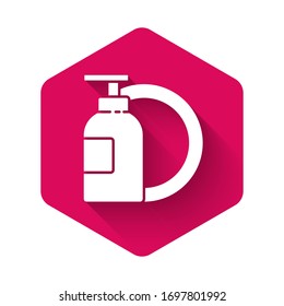 White Dishwashing liquid bottle and plate icon isolated with long shadow. Liquid detergent for washing dishes. Pink hexagon button. Vector Illustration