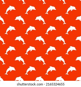 White dolphins seamless pattern with orange background.