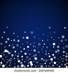White dots Christmas background. Subtle flying snow flakes and stars on dark blue night background. Alluring winter silver snowflake overlay template. Graceful vector illustration.