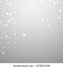 White dots Christmas background. Subtle flying snow flakes and stars on light grey background. Adorable winter silver snowflake overlay template. Resplendent vector illustration.