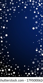 White dots Christmas background. Subtle flying snow flakes and stars on dark blue background. Actual winter silver snowflake overlay template. Mind-blowing vertical illustration.