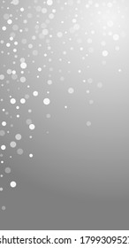 White dots Christmas background. Subtle flying snow flakes and stars on grey background. Amazing winter silver snowflake overlay template. Actual vertical illustration.