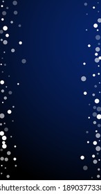 White dots Christmas background. Subtle flying snow flakes and stars on dark blue background. Adorable winter silver snowflake overlay template. Charming vertical illustration.