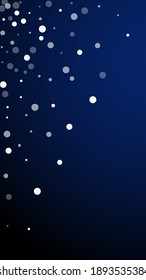 White dots Christmas background. Subtle flying snow flakes and stars on dark blue background. Adorable winter silver snowflake overlay template. Magnificent vertical illustration.