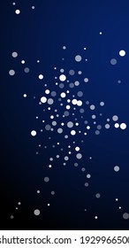 White dots Christmas background. Subtle flying snow flakes and stars on dark blue background. Alive winter silver snowflake overlay template. Gorgeous vertical illustration.