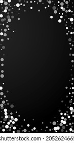 White dots Christmas background. Subtle flying snow flakes and stars on black background. Admirable winter silver snowflake overlay template. Astonishing vertical illustration.