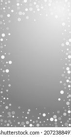 White dots Christmas background. Subtle flying snow flakes and stars on grey background. Amusing winter silver snowflake overlay template. Awesome vertical illustration.