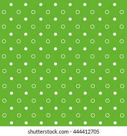 White dots and rings on green backgrounds. Summer tablecloth. Snow circles