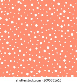 White dots sealmess pattern with pink background.