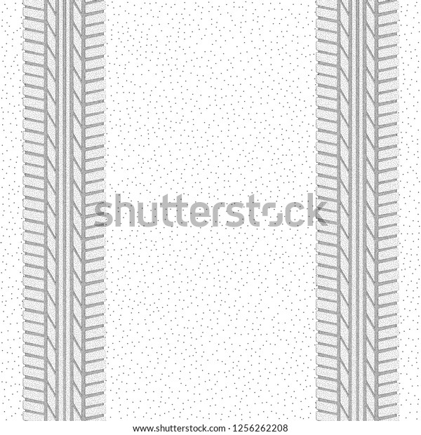 White dotted\
background with gray tire\
tracks