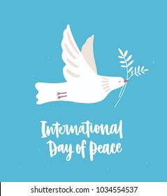 White dove, pigeon or bird flying and carrying olive branch. Beautiful symbol of love and pacifism and International Day of Peace inscription or hand lettering. Flat cartoon vector illustration.