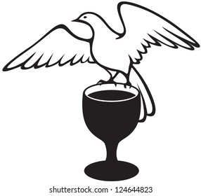 A white dove sitting on a bowl