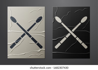 White Drum sticks icon isolated on crumpled paper background. Musical instrument. Paper art style. Vector Illustration