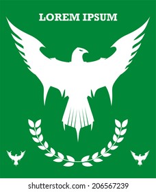 White eagle over green background