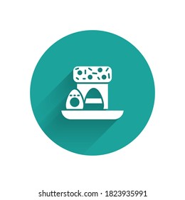 White Easter cake and eggs icon isolated with long shadow. Happy Easter. Green circle button. Vector Illustration