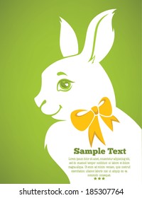 white Easter rabbits silhouette on green background for your text