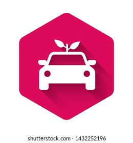 White Eco car concept drive with leaf icon isolated with long shadow. Green energy car symbol. Pink hexagon button. Vector Illustration