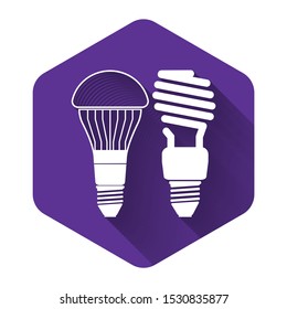 White Economical LED illuminated lightbulb and fluorescent light bulb icon isolated with long shadow. Save energy lamp. Purple hexagon button. Vector Illustration