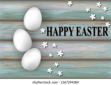 White eggs, flowers and text Happy Easter on wooden texture. Greeting card happy easter. Three Easter eggs on a wooden background.