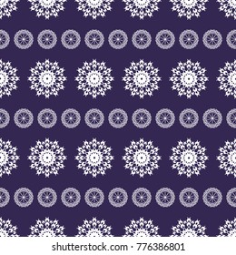the white eight-pointed shapes (snowflakes) form a seamless pattern on an ultra-violet background
