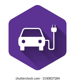 White Electric car and electrical cable plug charging icon isolated with long shadow. Electric car charging sign. Renewable eco technologies. Purple hexagon button. Vector Illustration