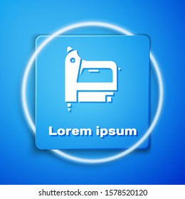 White Electric construction stapler icon isolated on blue background. Working tool. Blue square button. Vector Illustration