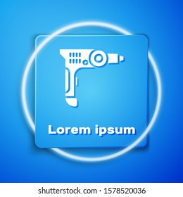 White Electric drill machine icon isolated on blue background. Repair tool. Blue square button. Vector Illustration