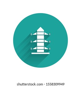 White Electric tower used to support an overhead power line icon isolated with long shadow. High voltage power pole line. Green circle button. Vector Illustration