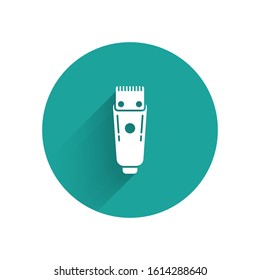 White Electrical hair clipper or shaver icon isolated with long shadow. Barbershop symbol. Green circle button. Vector Illustration