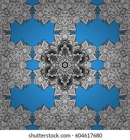 White element on a blue background. Damask background. White floral seamless pattern. Gray floral ornament in baroque style.