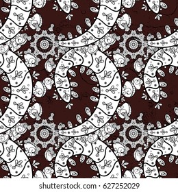 White element on brown background. Damask seamless repeating background. White Wallpaper on texture background. White floral ornament in baroque style.