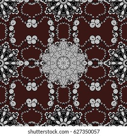 White element on brown background. White floral ornament in baroque style. Damask seamless pattern repeating background. Antique white repeatable wallpaper.