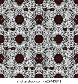 White element on brown background. White Wallpaper on texture background. Damask seamless repeating background. White floral ornament in baroque style.