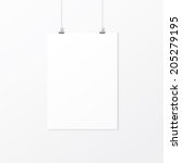 White empty paper with clips on the wall