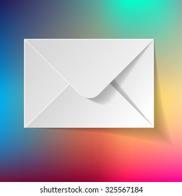 White envelope on a rainbow background.
