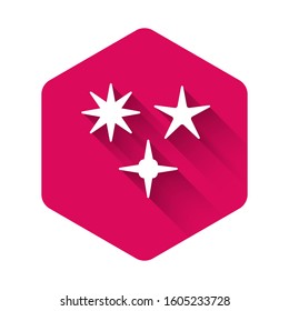 White Falling star icon isolated with long shadow. Meteoroid, meteorite, comet, asteroid, star icon. Pink hexagon button. Vector Illustration