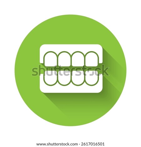 White False jaw icon isolated with long shadow. Dental jaw or dentures, false teeth with incisors. Green circle button. Vector