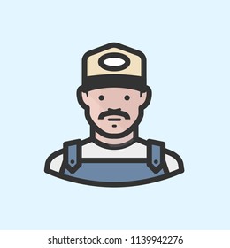 White farmer in baseball cap and denim overalls