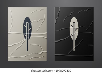 White Feather pen icon isolated on crumpled paper background. Paper art style. Vector