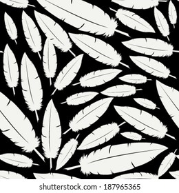 white feathers on black seamless pattern