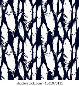 White feathers on dark background