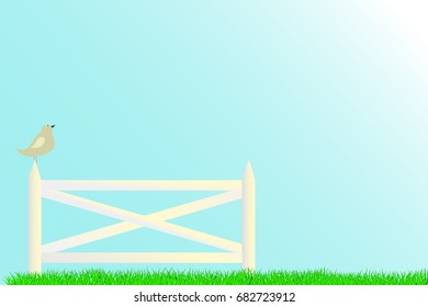 White fence and grass on the blue background