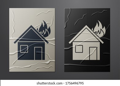 White Fire in burning house icon isolated on crumpled paper background. Paper art style. Vector Illustration