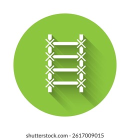 White Fire escape icon isolated with long shadow. Pompier ladder. Fireman scaling ladder with a pole. Green circle button. Vector