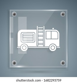 White Fire truck icon isolated on grey background. Fire engine. Firefighters emergency vehicle. Square glass panels. Vector Illustration