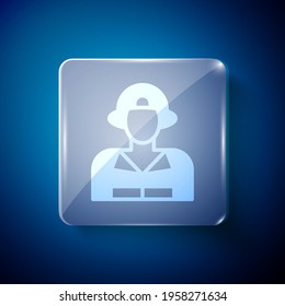 White Firefighter icon isolated on blue background. Square glass panels. Vector