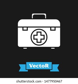 White First aid kit icon isolated on black background. Medical box with cross. Medical equipment for emergency. Healthcare concept.  Vector Illustration