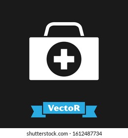 White First aid kit icon isolated on black background. Medical box with cross. Medical equipment for emergency. Healthcare concept.  Vector Illustration
