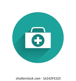 White First aid kit icon isolated with long shadow. Medical box with cross. Medical equipment for emergency. Healthcare concept. Green circle button. Vector Illustration